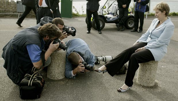 Photographers focus on the shoes on the cliff path at the Conservative party conference in Bournemouth in 2004. Photograph: Dan Chung for the Guardian