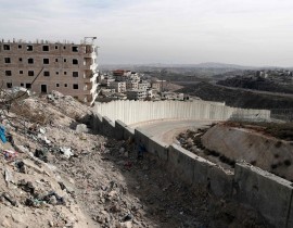 A picture taken on Dec. 5, 2017 shows a partial view of the Palestinian refugee camp of Shuafat in east Jerusalem, where tens of thousands Palestinians live enclosed by the Israeli controversial separation barrier.
