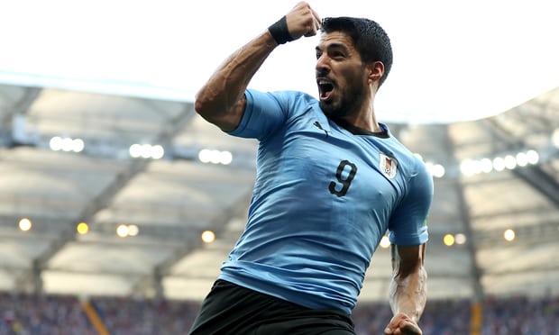 Luis Suárez sends Uruguay through with victory over Saudi Arabia