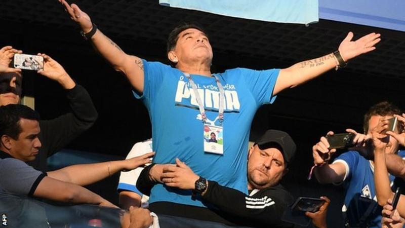 Diego Maradona 'fine' after being seen by doctor during World Cup match