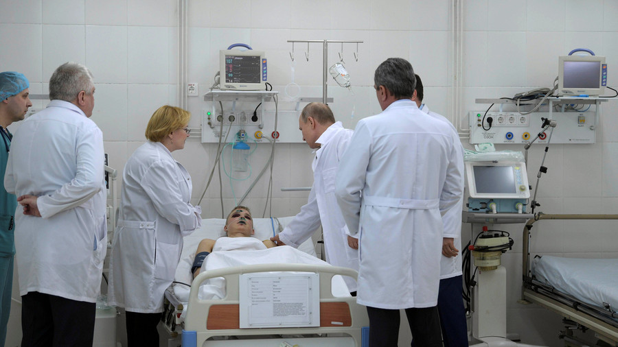 ‘One wants not to cry, but wail': Putin visits scene of Kemerovo mall inferno
